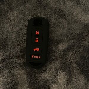 Black Car Key Fob with Red Buttons